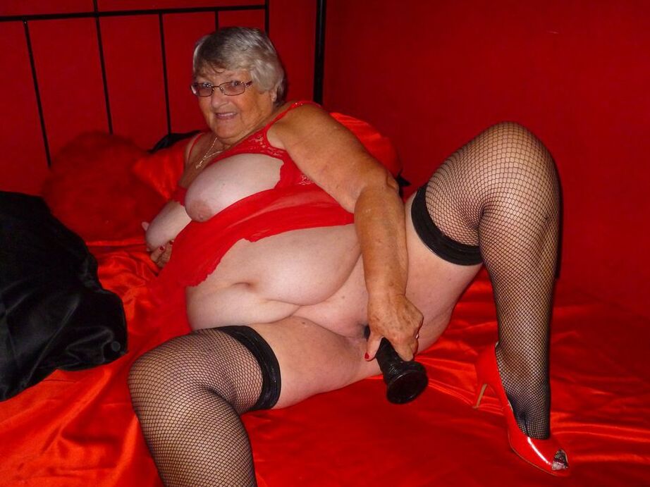 20P Obese nan Grandma Libby dildos her freshly shaved vagina on a bed