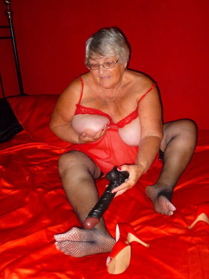 20P Obese nan Grandma Libby dildos her freshly shaved vagina on a bed