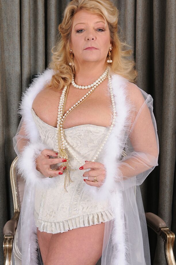 16P Classy older lady Karen Summer pulls a strand of pearls out of her beaver