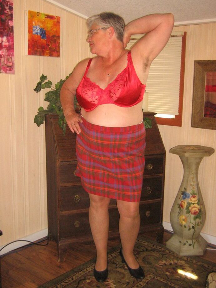 20P Old amateur Girdle Goddess plays with a sex toy while disrobing by herself