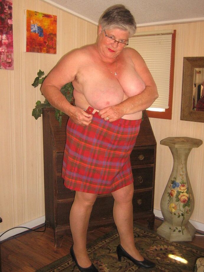 20P Old amateur Girdle Goddess plays with a sex toy while disrobing by herself