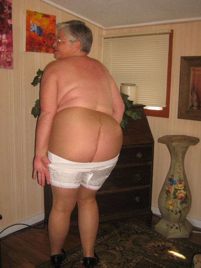 20P Old amateur Girdle Goddess plays with a sex toy while disrobing by herself