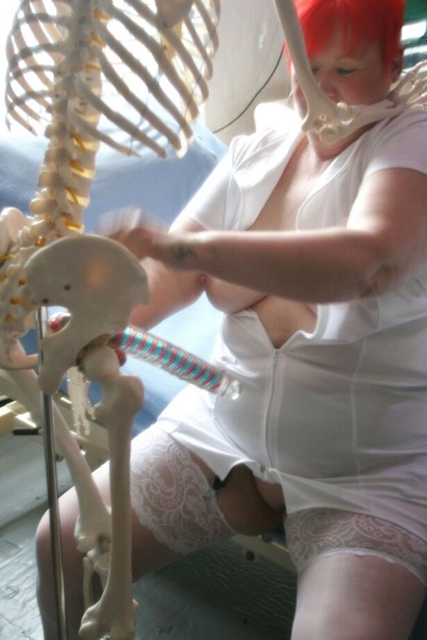 20P Older redheaded BBW Valgasmic Exposed has sexual relations with a skeleton