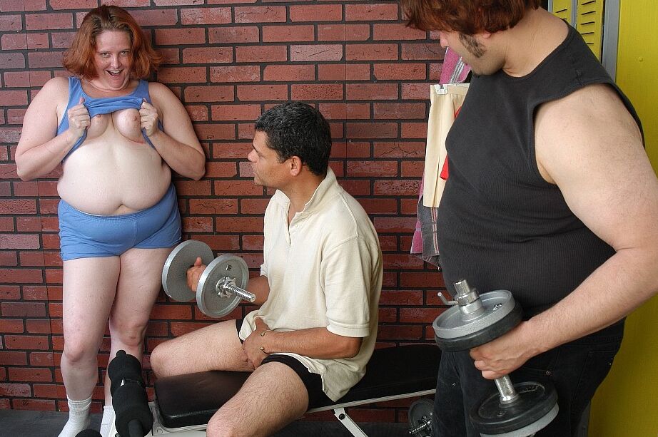 16P Fat older redhead Adrienne sucks and fucks two cocks in weight room
