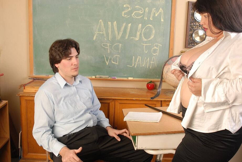 16P Brunette fatty Olivia tucking her student in classroom for grades