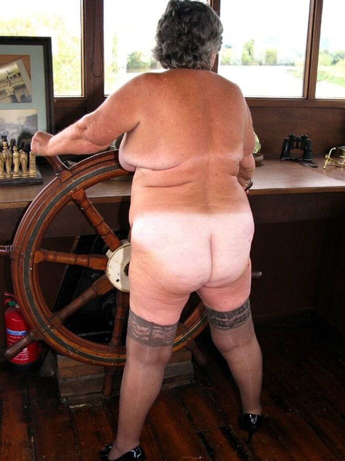 20P Fat British nan Grandma Libby masturbates in stockings while on board a boat