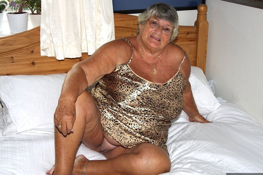 20P Silver haired senior citizen Grandma Libby masturbates on her bed with a toy