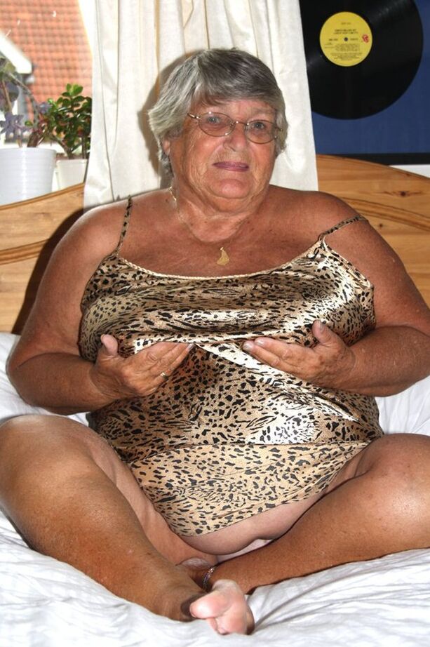20P Silver haired senior citizen Grandma Libby masturbates on her bed with a toy
