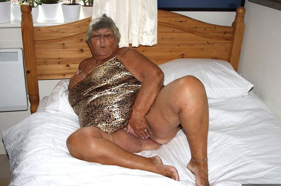 20P Silver haired senior citizen Grandma Libby masturbates on her bed with a toy