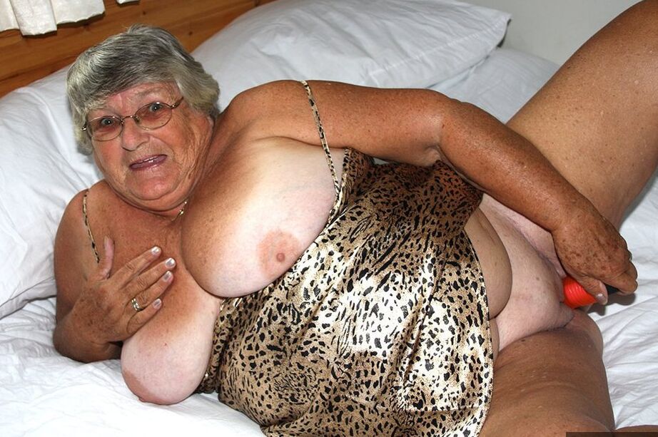 20P Silver haired senior citizen Grandma Libby masturbates on her bed with a toy