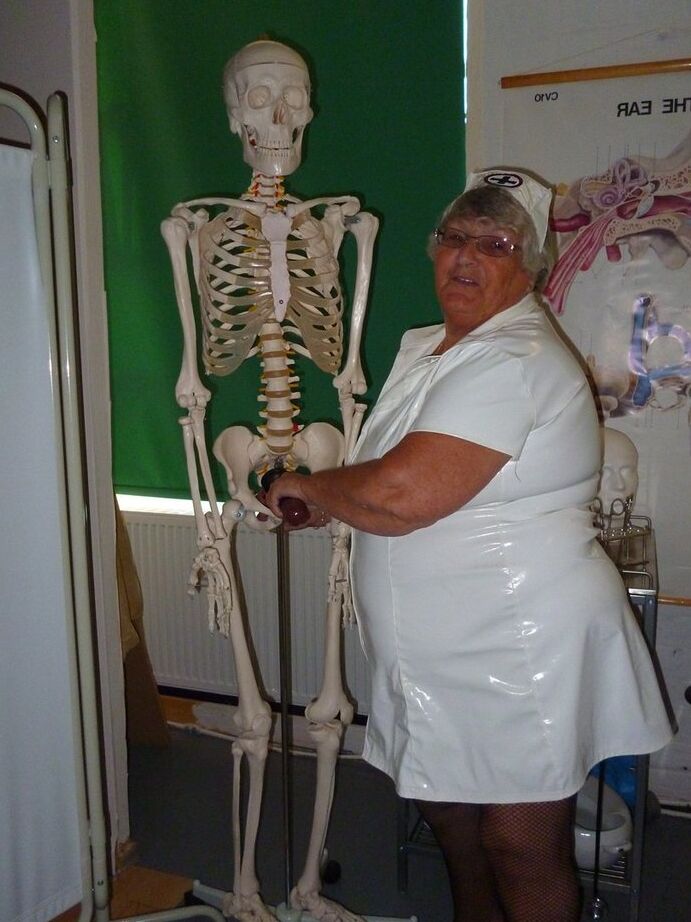 20P Fat old nurse Grandma Libby attaches a dildo to a skeleton for sexual relief