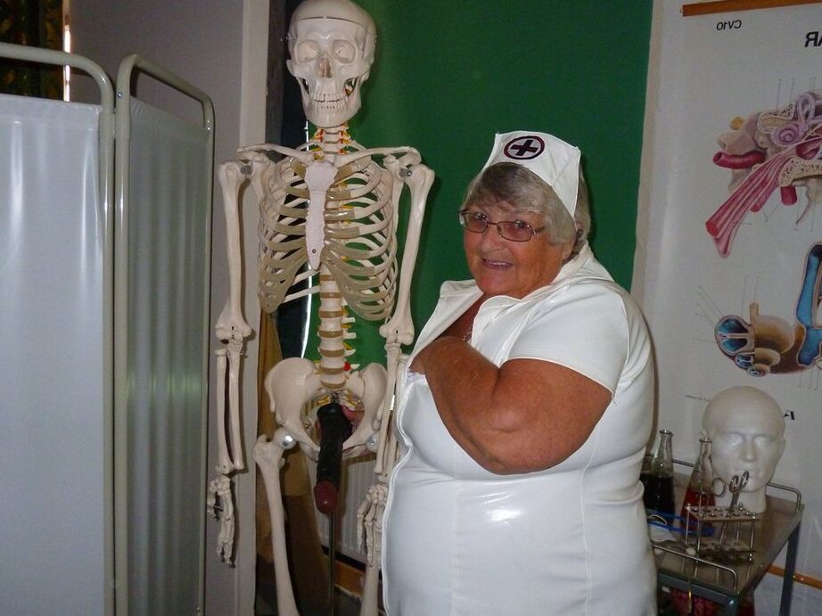 20P Fat old nurse Grandma Libby attaches a dildo to a skeleton for sexual relief