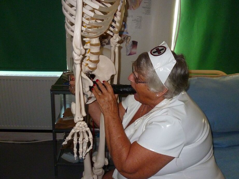 20P Fat old nurse Grandma Libby attaches a dildo to a skeleton for sexual relief