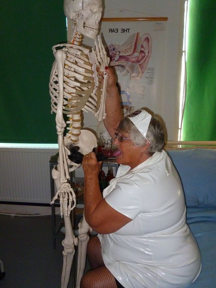 20P Fat old nurse Grandma Libby attaches a dildo to a skeleton for sexual relief
