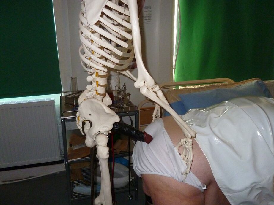 20P Fat old nurse Grandma Libby attaches a dildo to a skeleton for sexual relief