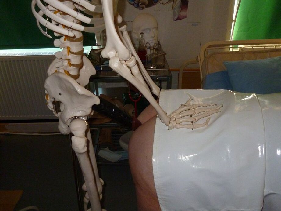20P Fat old nurse Grandma Libby attaches a dildo to a skeleton for sexual relief