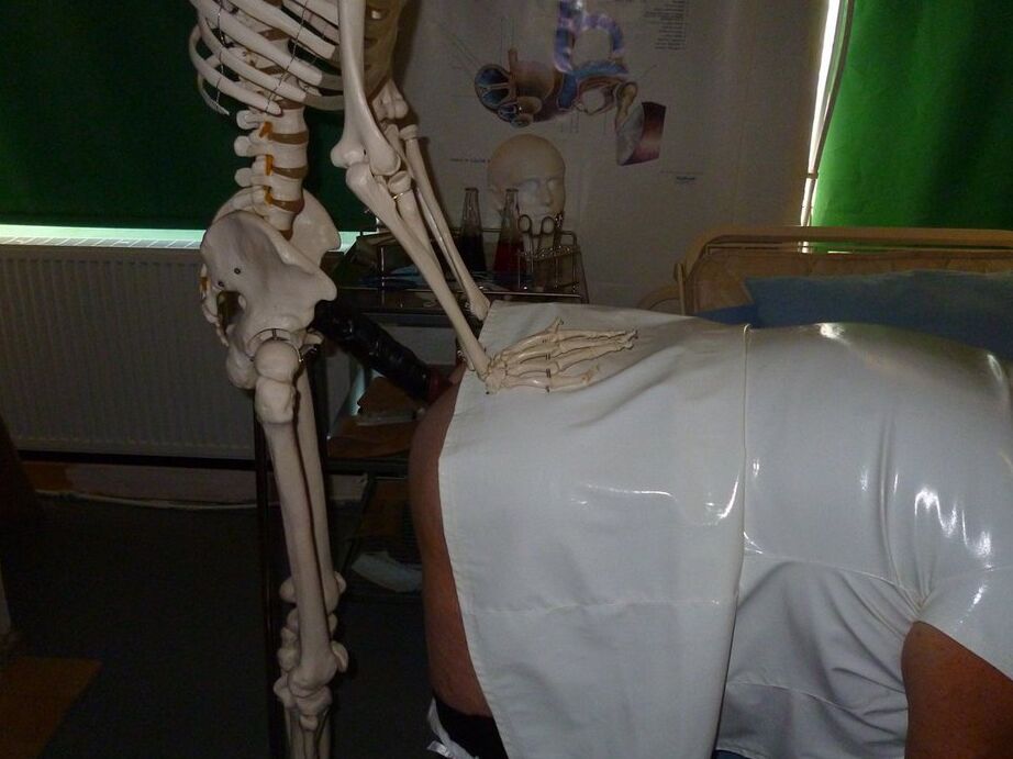 20P Fat old nurse Grandma Libby attaches a dildo to a skeleton for sexual relief