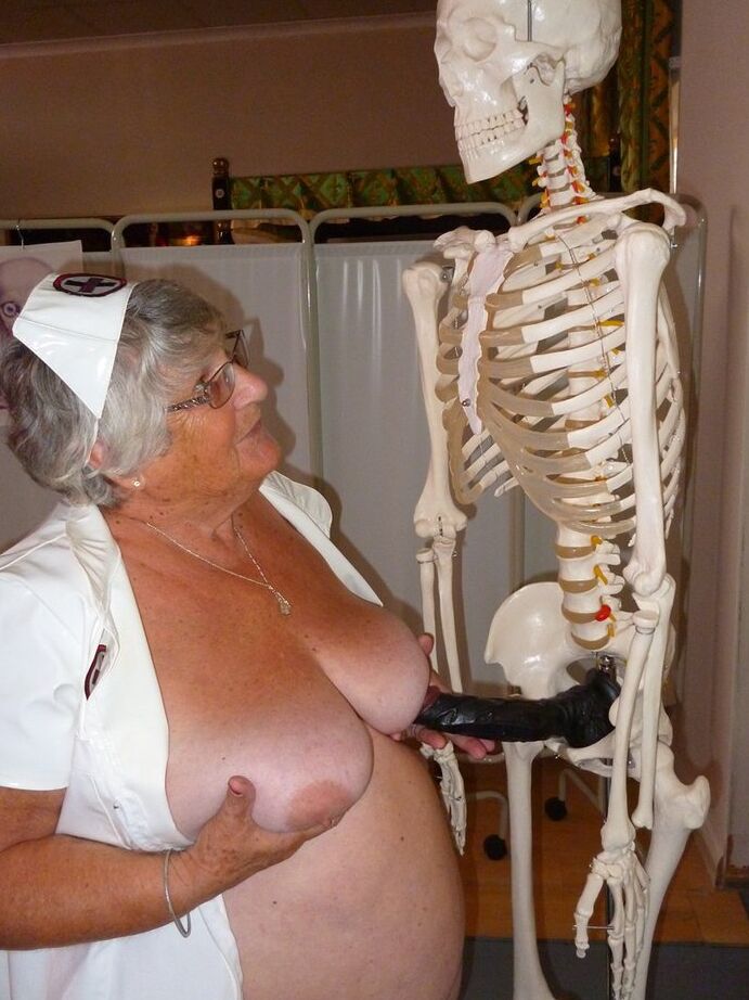 20P Fat old nurse Grandma Libby attaches a dildo to a skeleton for sexual relief