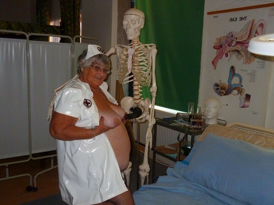 20P Fat old nurse Grandma Libby attaches a dildo to a skeleton for sexual relief