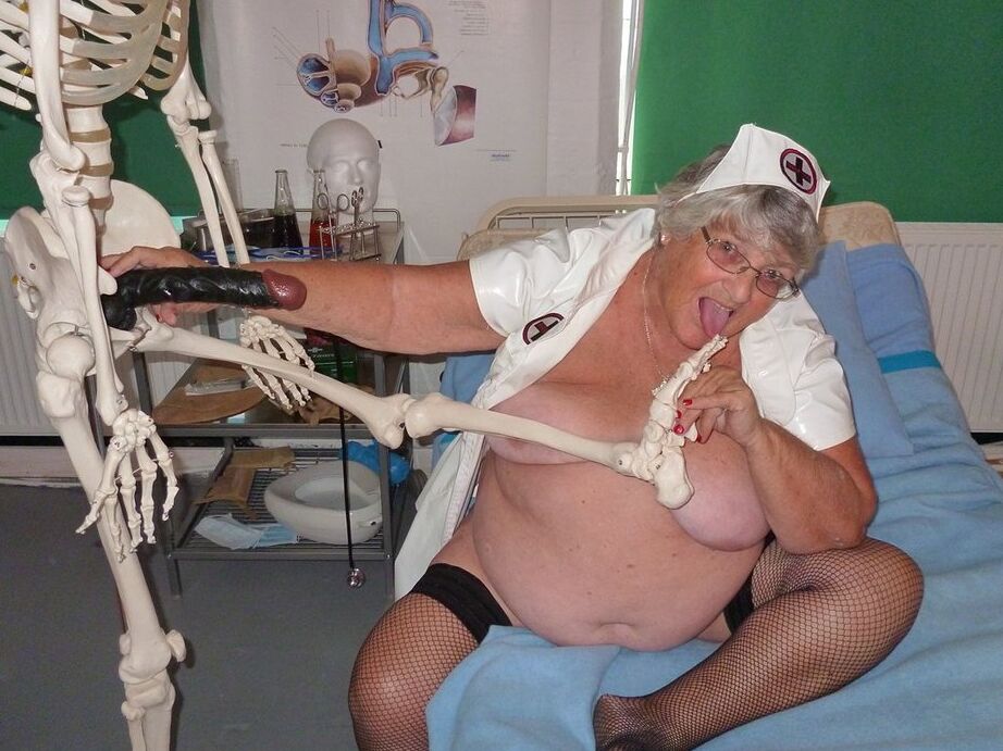 20P Fat old nurse Grandma Libby attaches a dildo to a skeleton for sexual relief