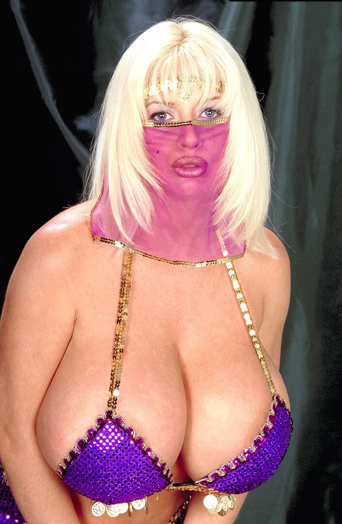 16P Blonde chick Sarenna Lee unleashes her enhanced breasts in a harem outfit