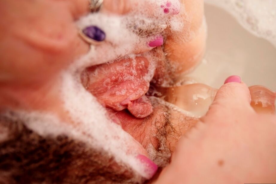 20P Big titted British woman Juicey Janey dildos her beaver while taking a bath