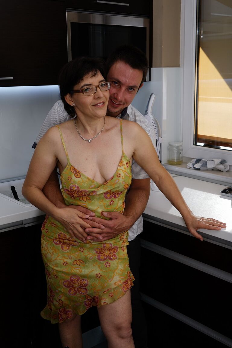 16P Older granny kissing and petting her toy boy and fucking in the kitchen