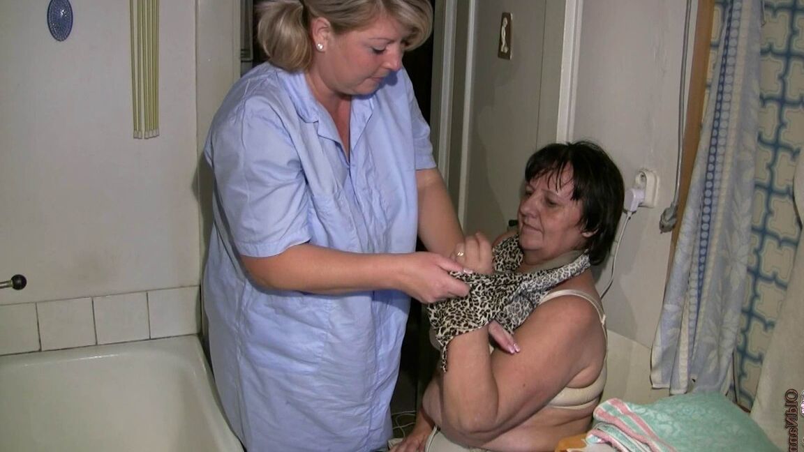 21P Chubby granny Gisela gets her twat rubbed while getting bathed by nurse Kata