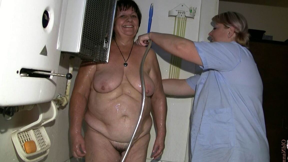 21P Chubby granny Gisela gets her twat rubbed while getting bathed by nurse Kata