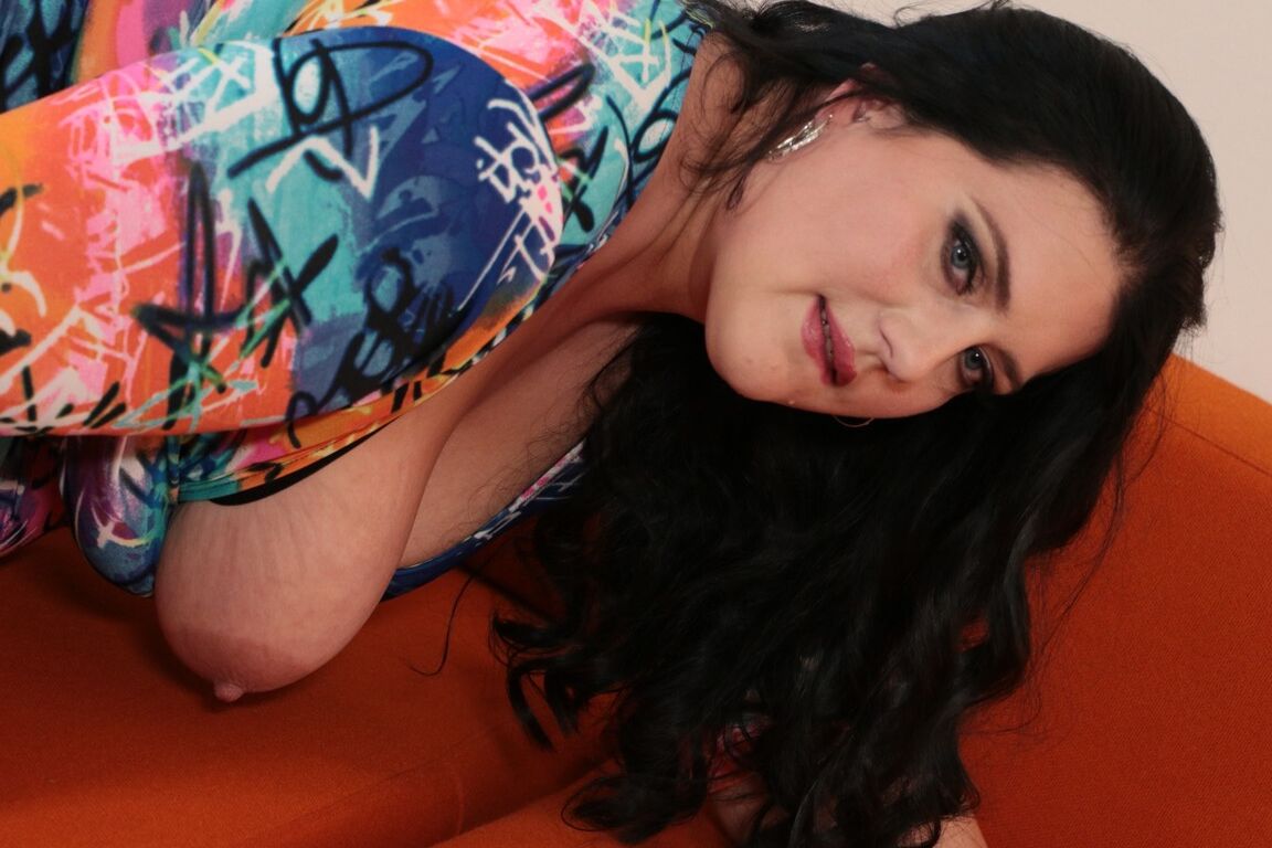 21P Dark haired BBW Becki Butterfly plays with her juicy knockers and pierced cunt