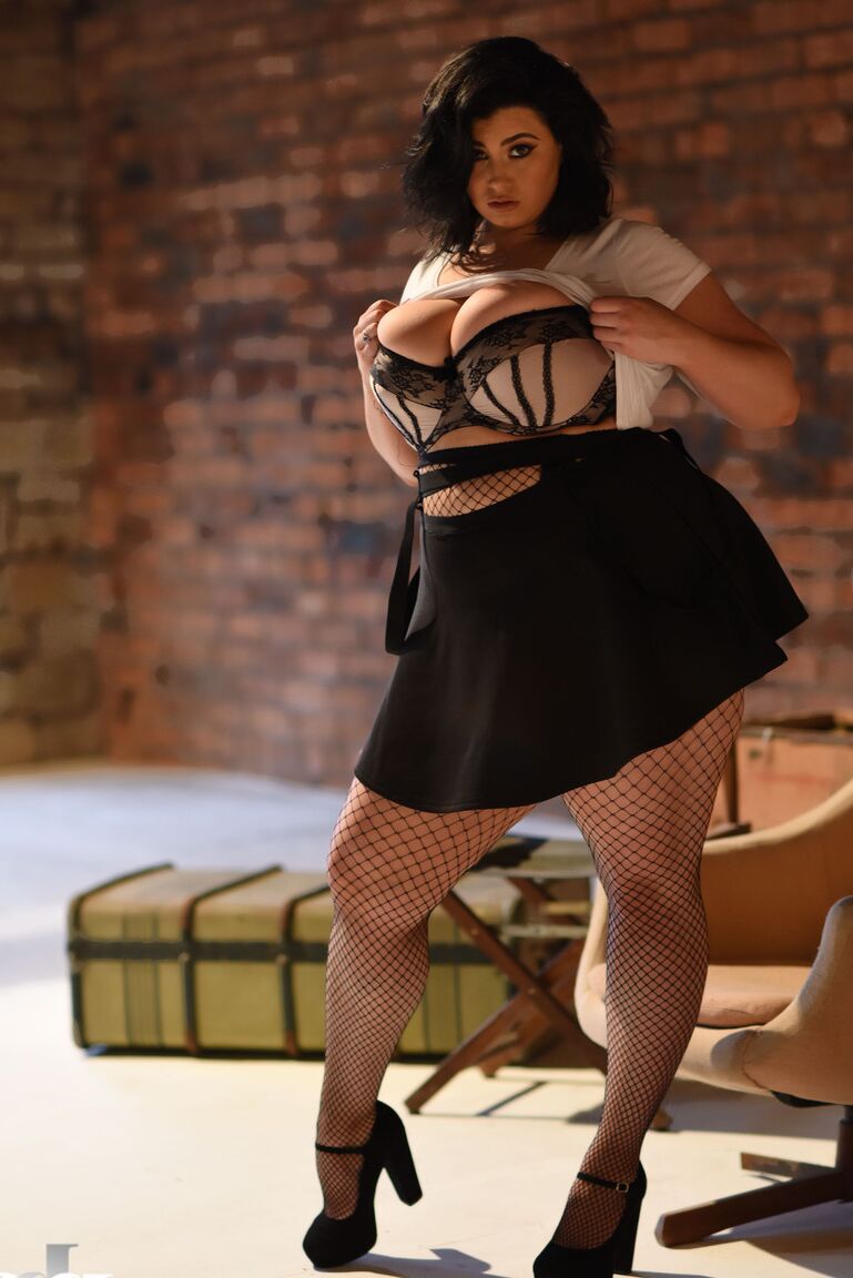 21P Chubby gorgeous lady Kiki lets out her massive juggs wearing a short skirt