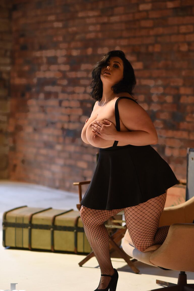 21P Chubby gorgeous lady Kiki lets out her massive juggs wearing a short skirt