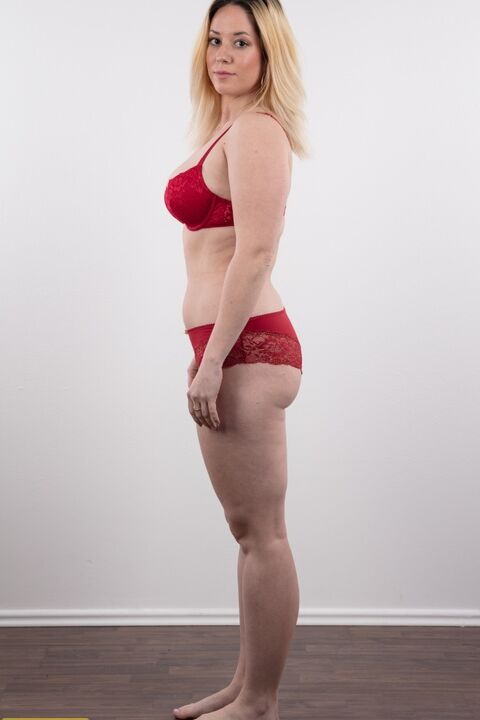 20P Chubby amateur Veronika stands totally naked after removing her clothes