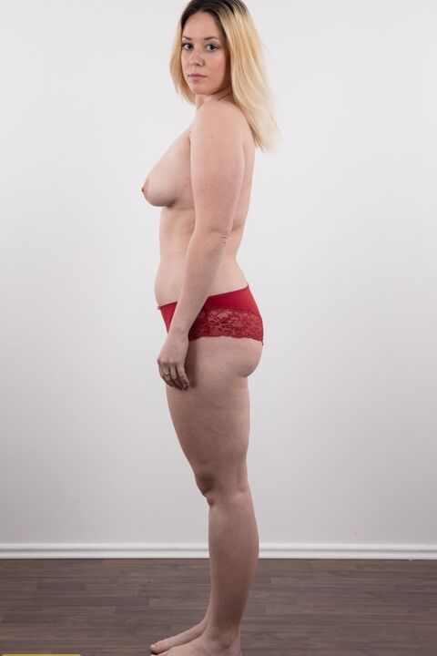 20P Chubby amateur Veronika stands totally naked after removing her clothes