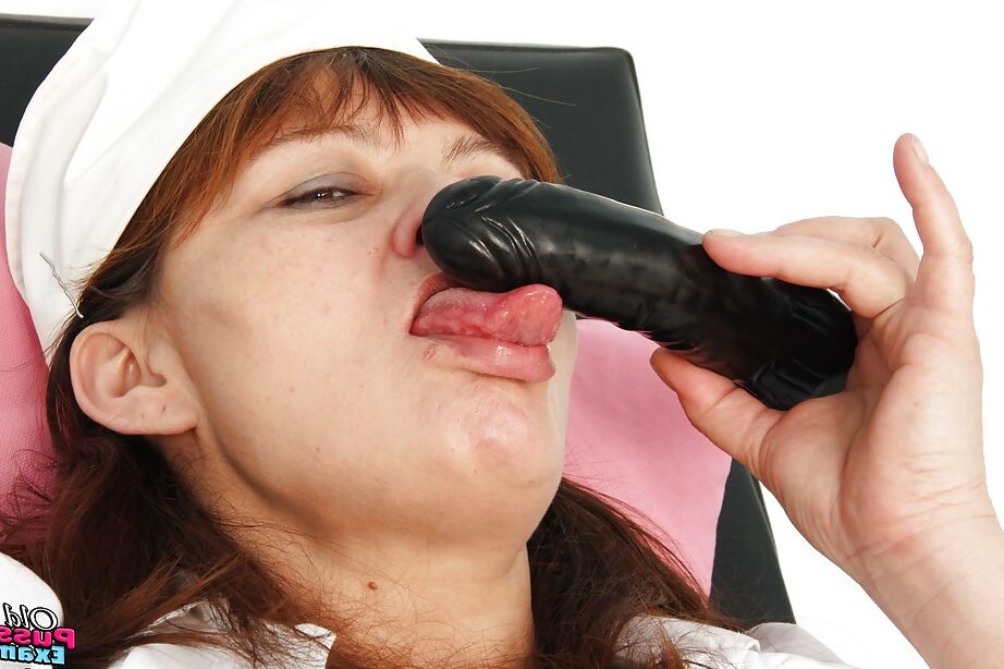 16P Naughty mature nurse stuffing her twat with a big dildo and gyno stuff