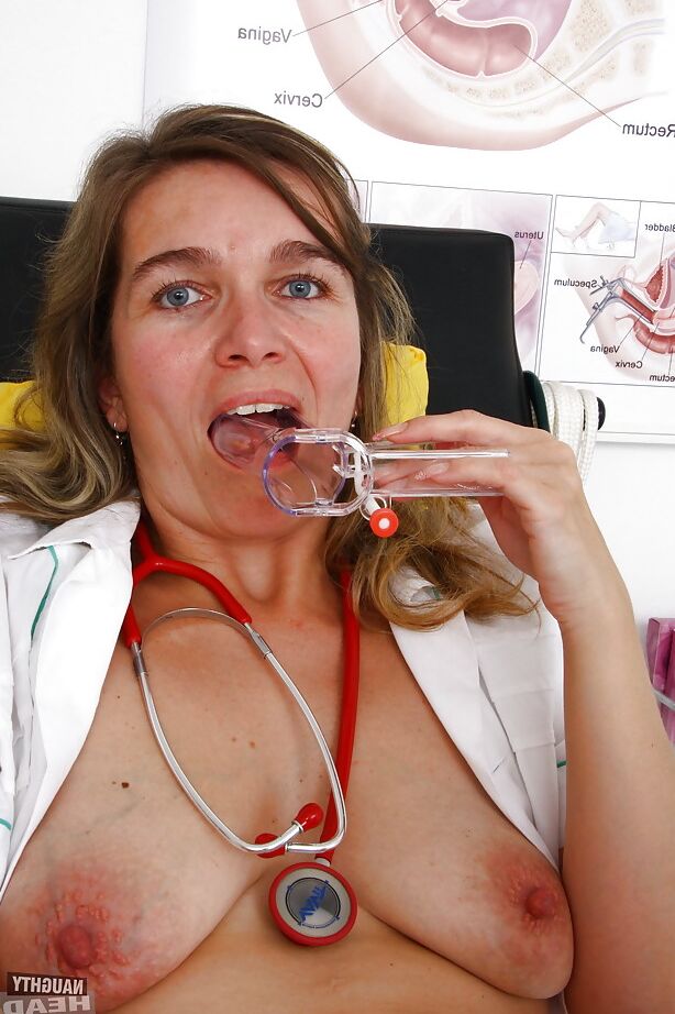 16P Chubby mature nurse bares saggy tits while inserting speculum in vagina