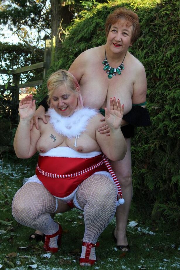 20P Overweight older redhead Kinky Carol fools around with a fat lesbian in a yard