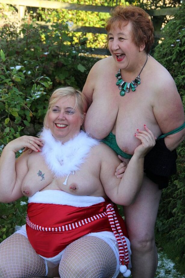 20P Overweight older redhead Kinky Carol fools around with a fat lesbian in a yard