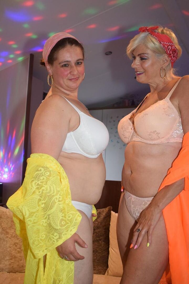 16P Mature lesbians strip each other naked in heels on a couch