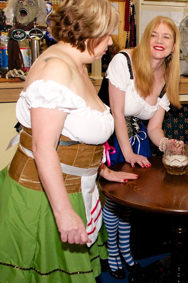 20P British amateur Lily May and a girlfriend serve pints and pussies in a pub