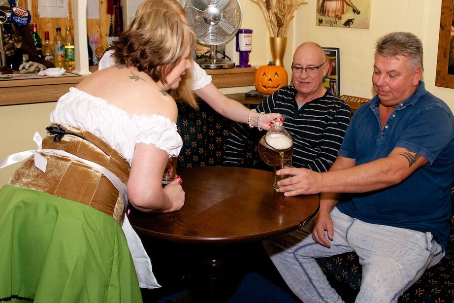 20P British amateur Lily May and a girlfriend serve pints and pussies in a pub
