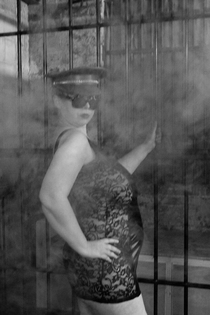16P British fatty Posh Sophia models fetish wear in and out of a jail cell