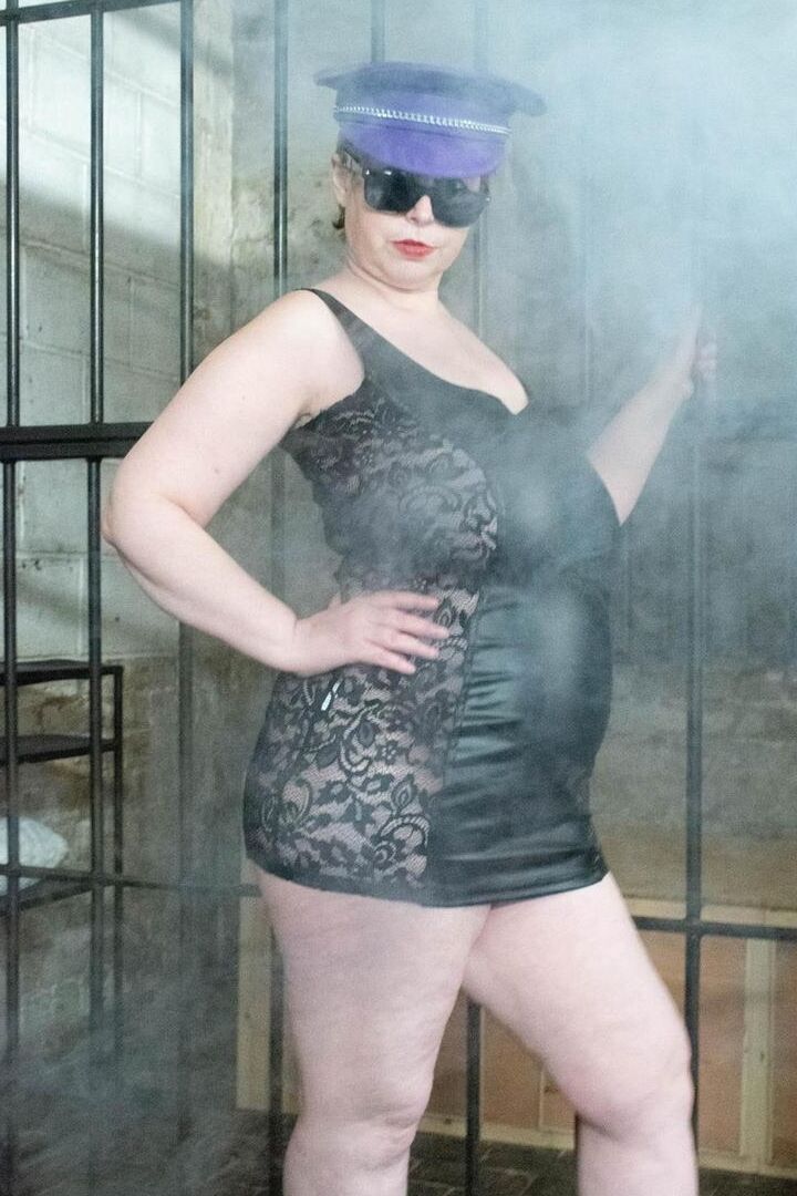 16P British fatty Posh Sophia models fetish wear in and out of a jail cell