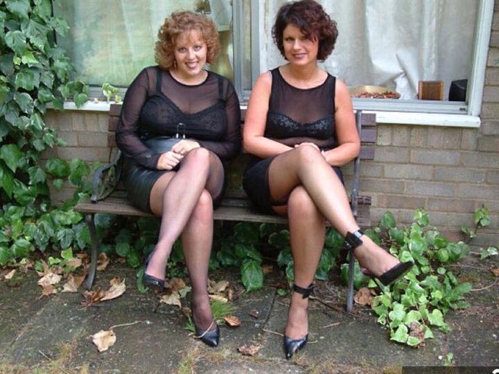 20P UK woman Curvy Claire and a GF strip to their underthings afore a man