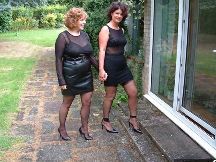 20P UK woman Curvy Claire and a GF strip to their underthings afore a man