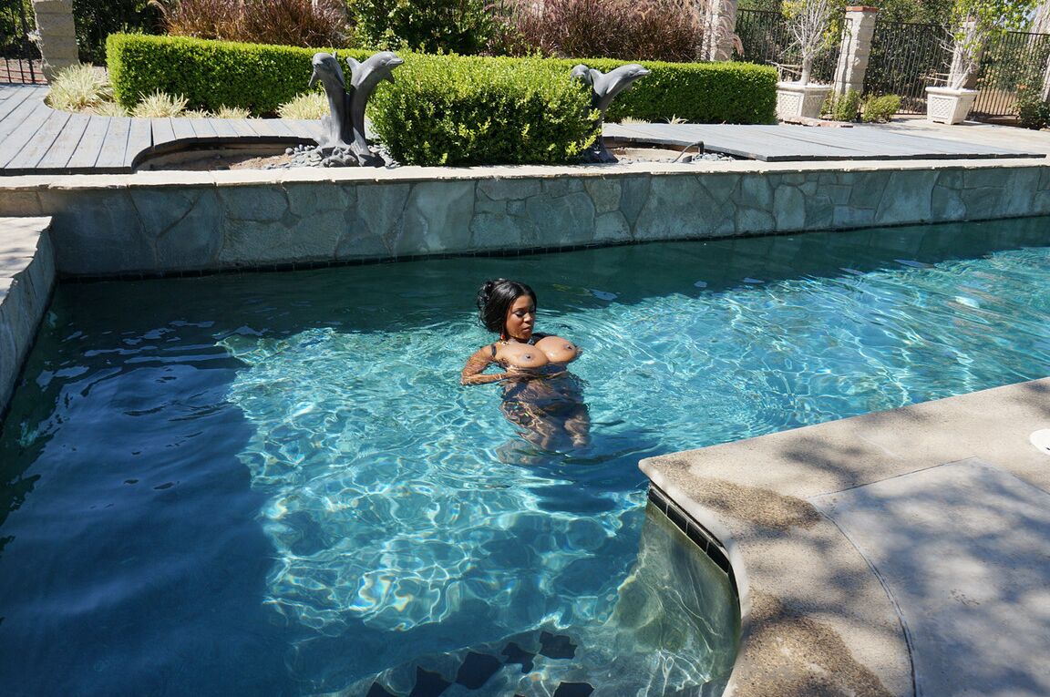 17P Massively endowed fatty Maserati XXX floats her enormous big tits in the pool