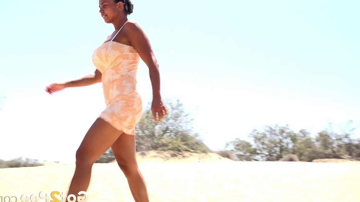 15P Solo girl Chloe Lamour takes a big piss while crossing a patch of sand