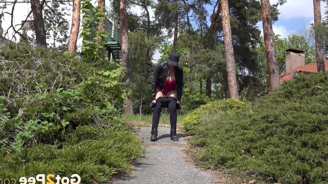 15P Busty Chloe squats and enjoys a long pee