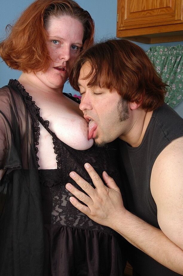 16P Older redheaded fatty Adrienne taking blast of jism on pierced tongue