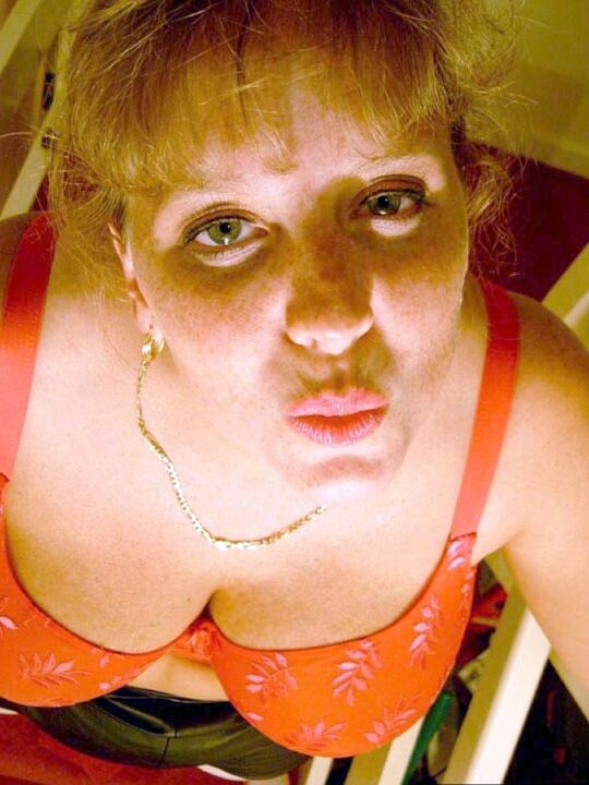 20P UK amateur Curvy Claire drinks wine from a bottle before posing in underthings